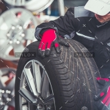 demo-attachment-241-replacing-car-tires-F6SZJYW